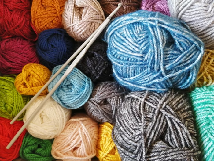 Various colorful balls of yarn- a hobby that can turn profitable
